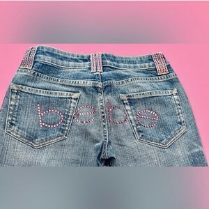 bebe Blue Denim Bootcut Jeans with Pink Crystal Logo